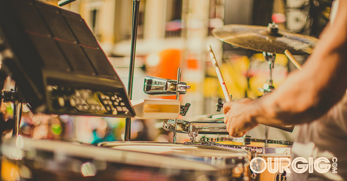 many playing drums in concert