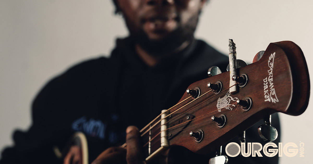 cool view of many playing guitar