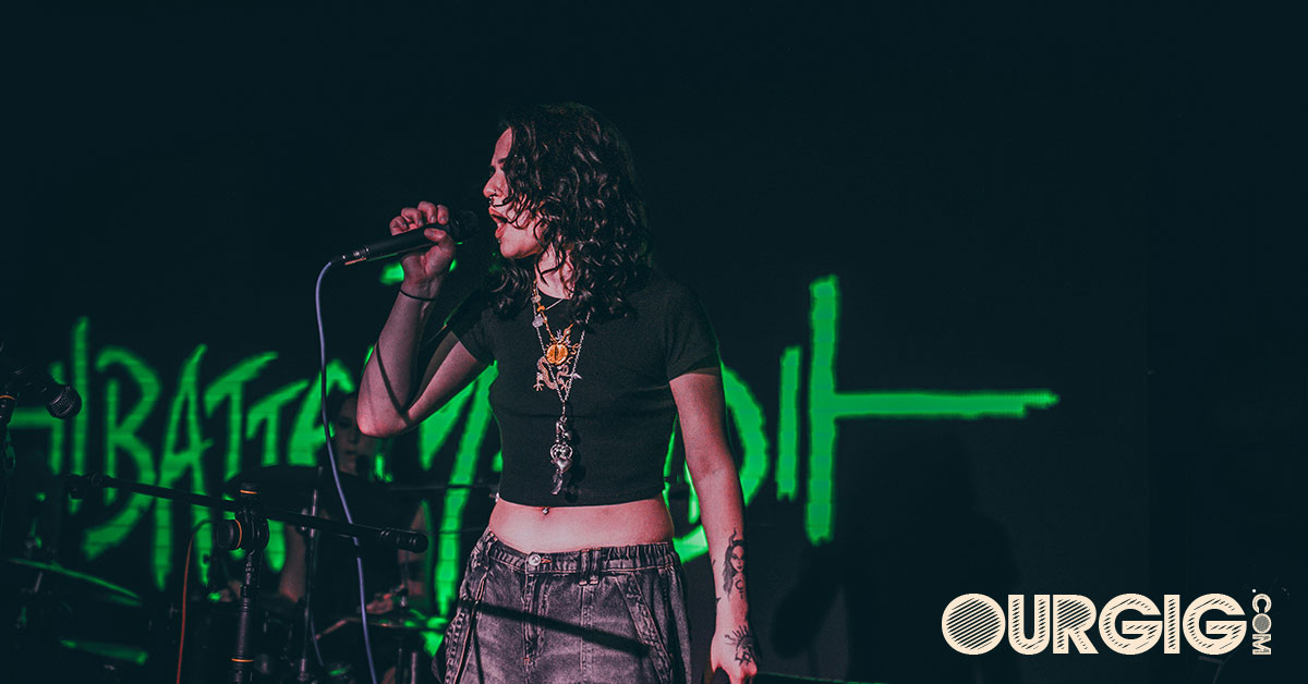 female rocker performing on stage