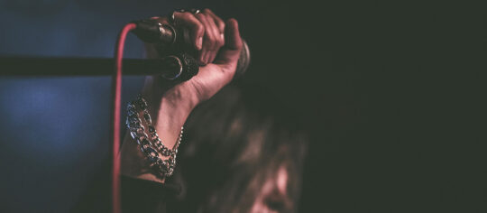 artist performing on state