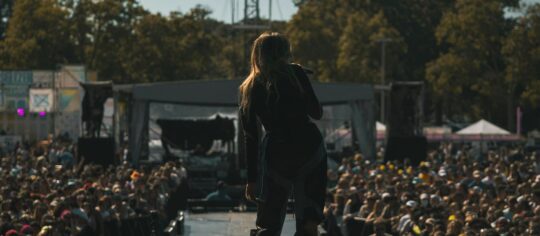 female vocalist in outdoor concert