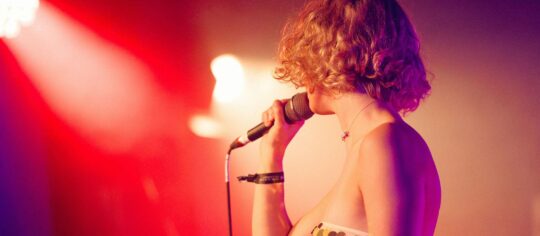 female vocalist in concert very cool lights