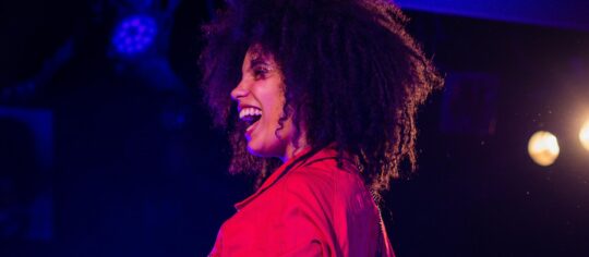 female vocalist on state happy to be performing live