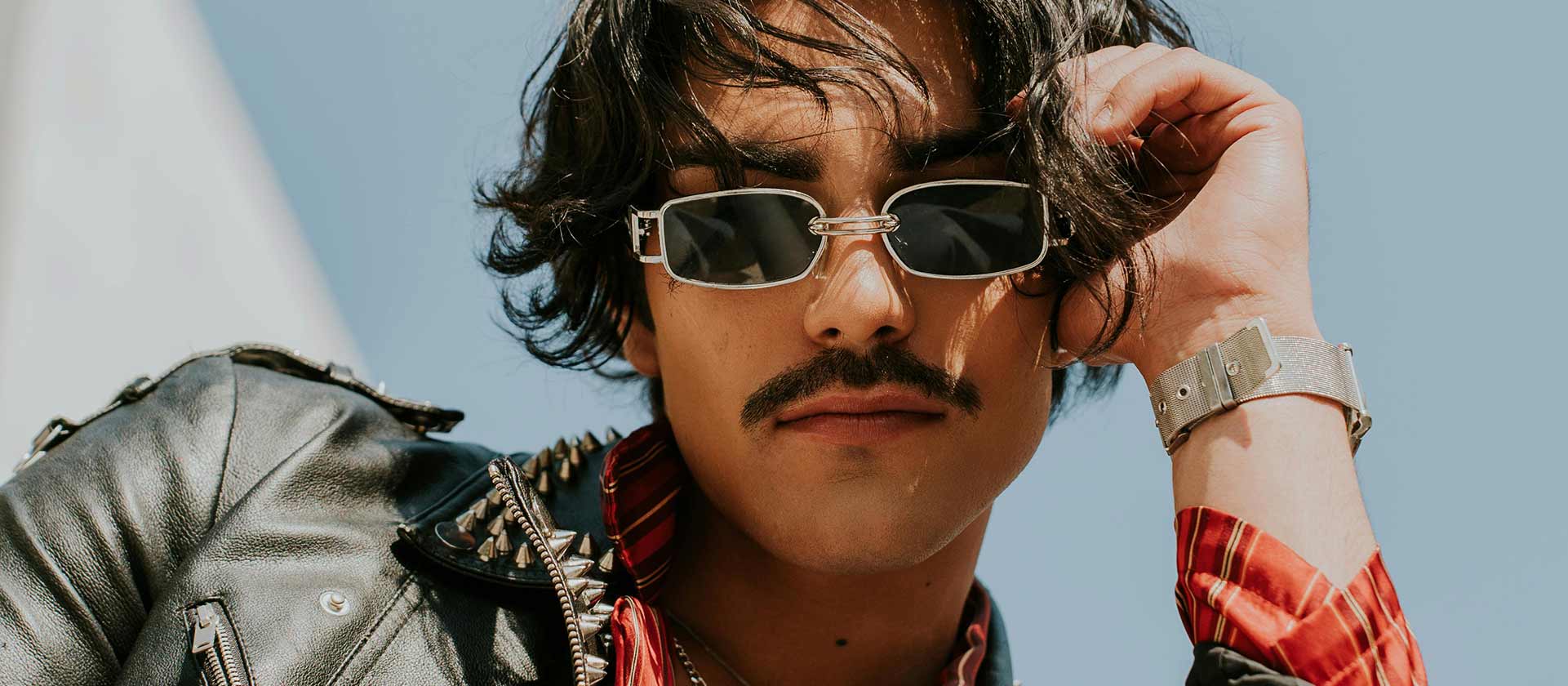 male artists headshot sunny day