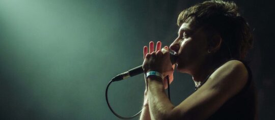 male vocalist in concert