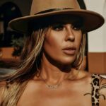 female artist on location for music video