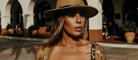 female artist on location for music video