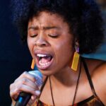 female vocalist performing live