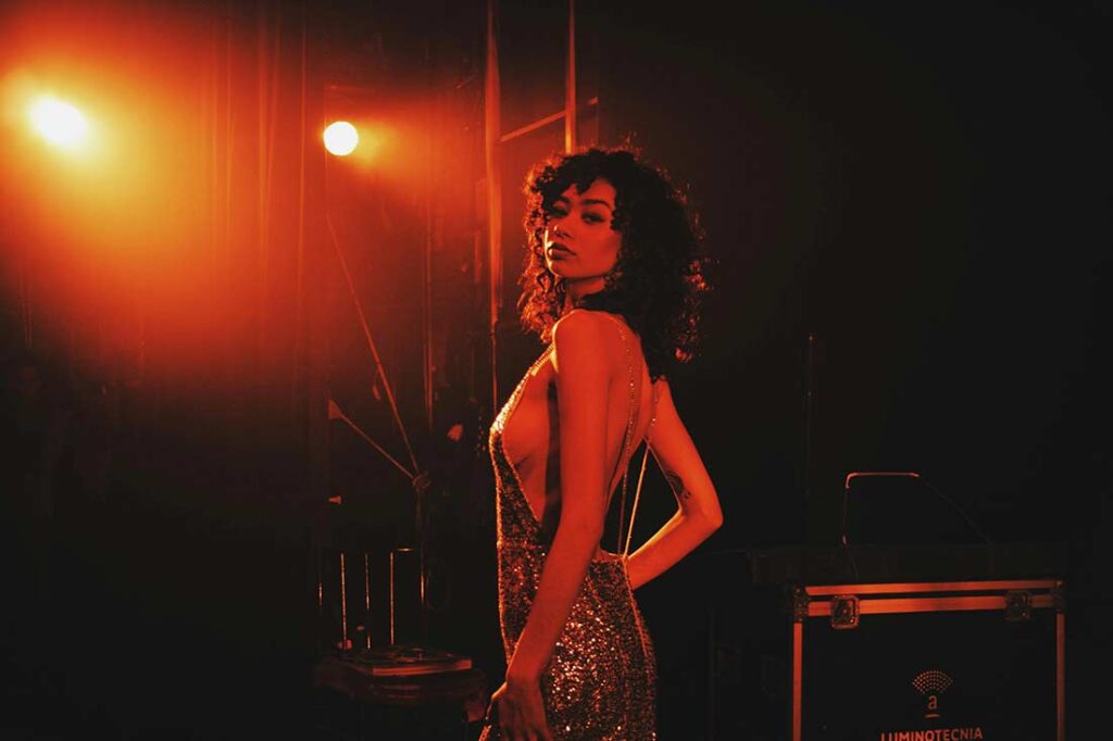 female artist stage left