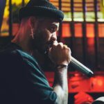 male vocalist performing live