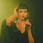 female artists on stage in vintage clothes