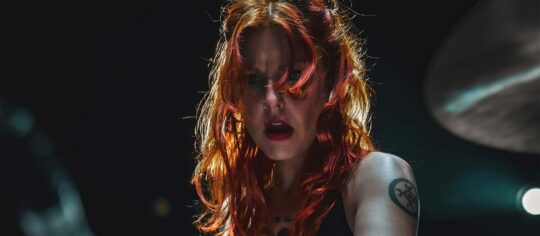 female artist in concert