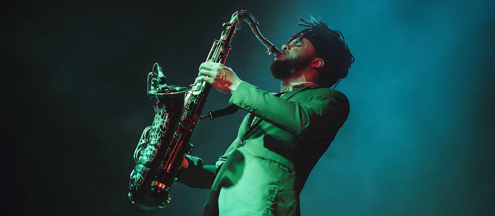 male saxophone player on stage