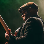 male guitar player on stage