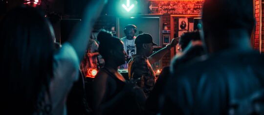 people dancing to DJ