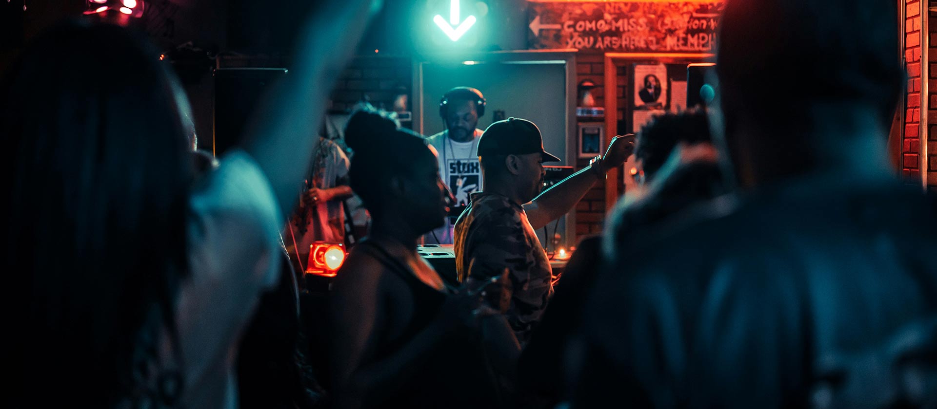 people dancing to DJ