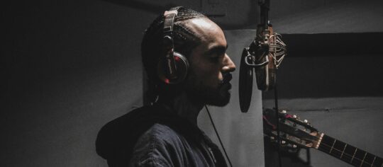 male artists during recording session