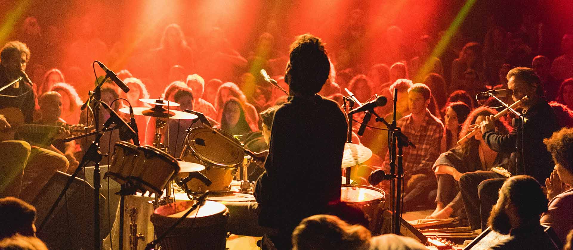 artist performing in close proximity to audienct