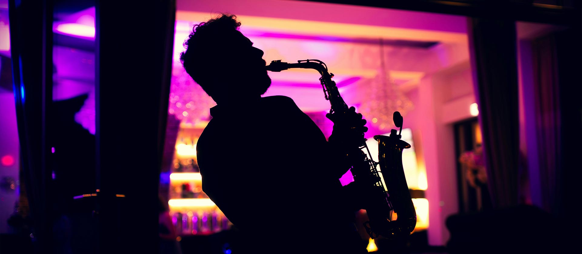 sax player performing in jazz club