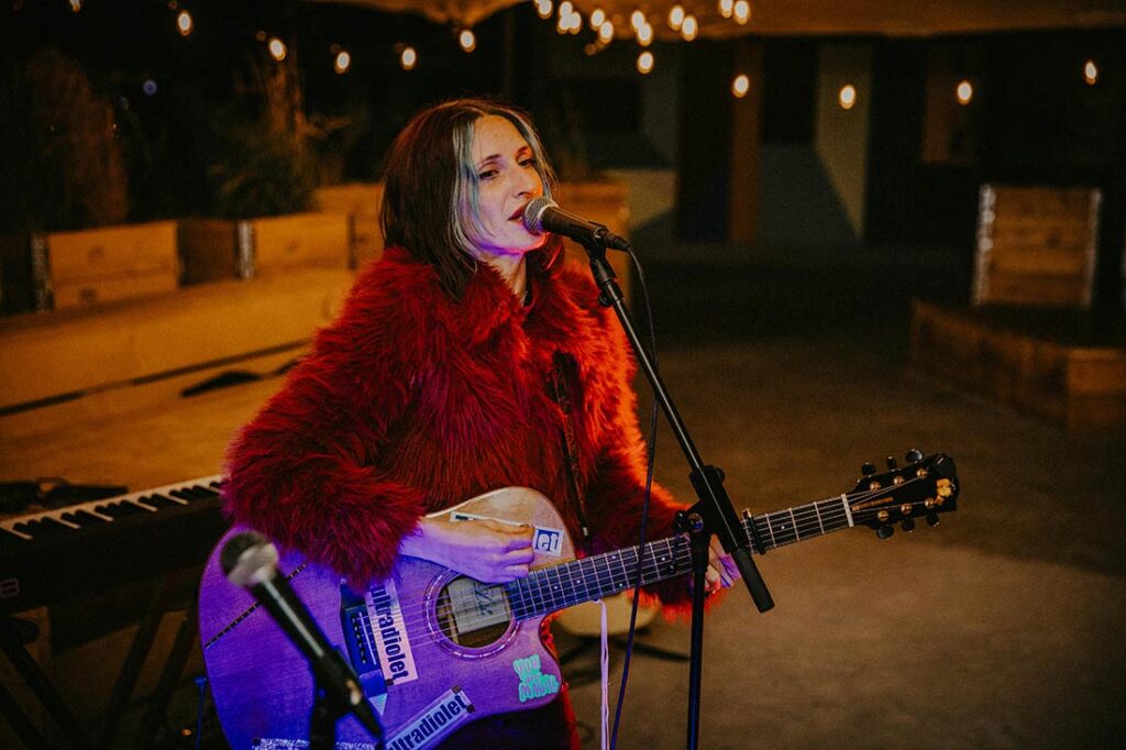 sing songwriter on stage