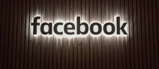 facebook logo on wall