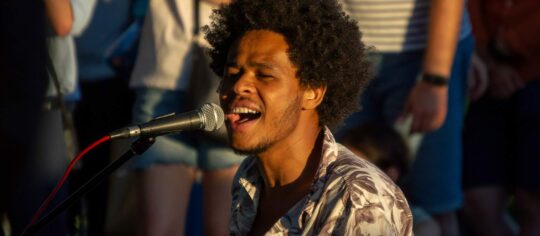 male artist performing in public