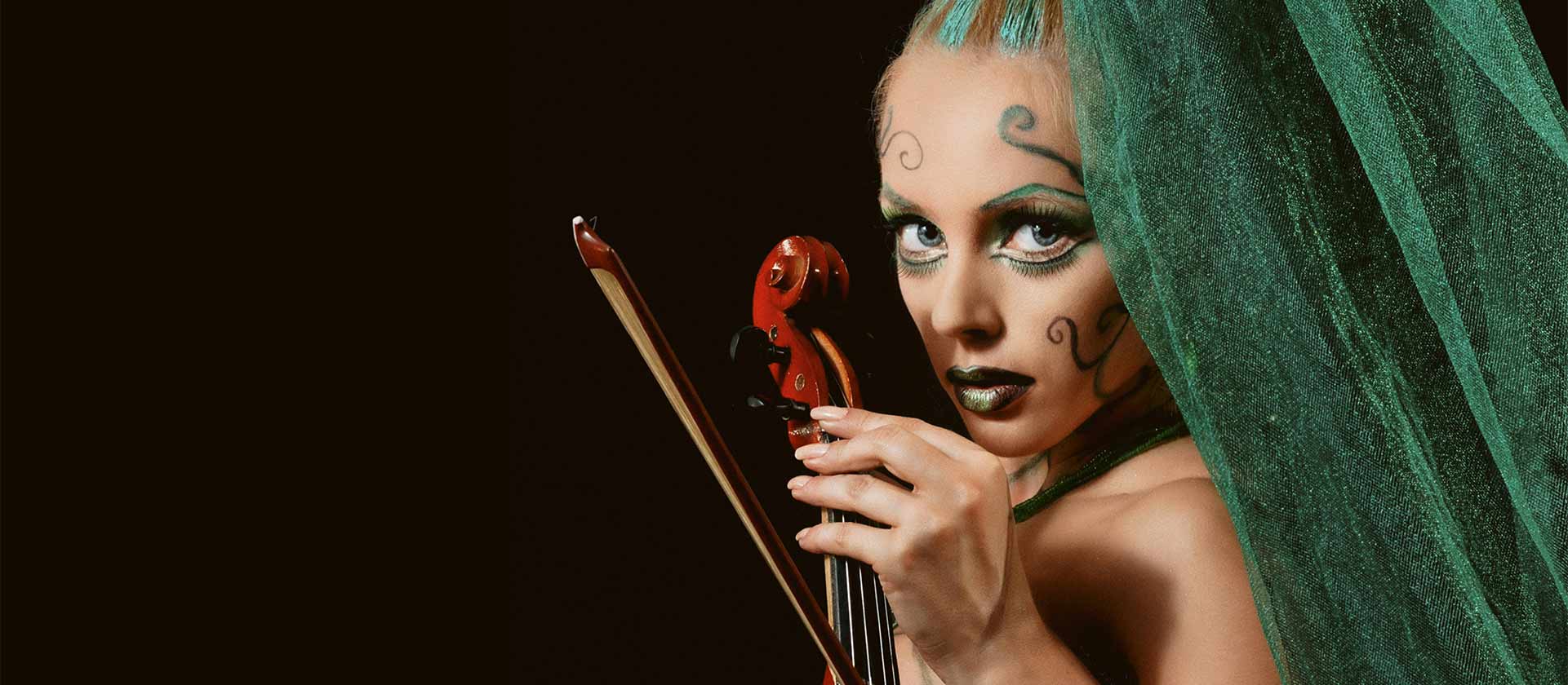 woman violinist wild styling in headshot